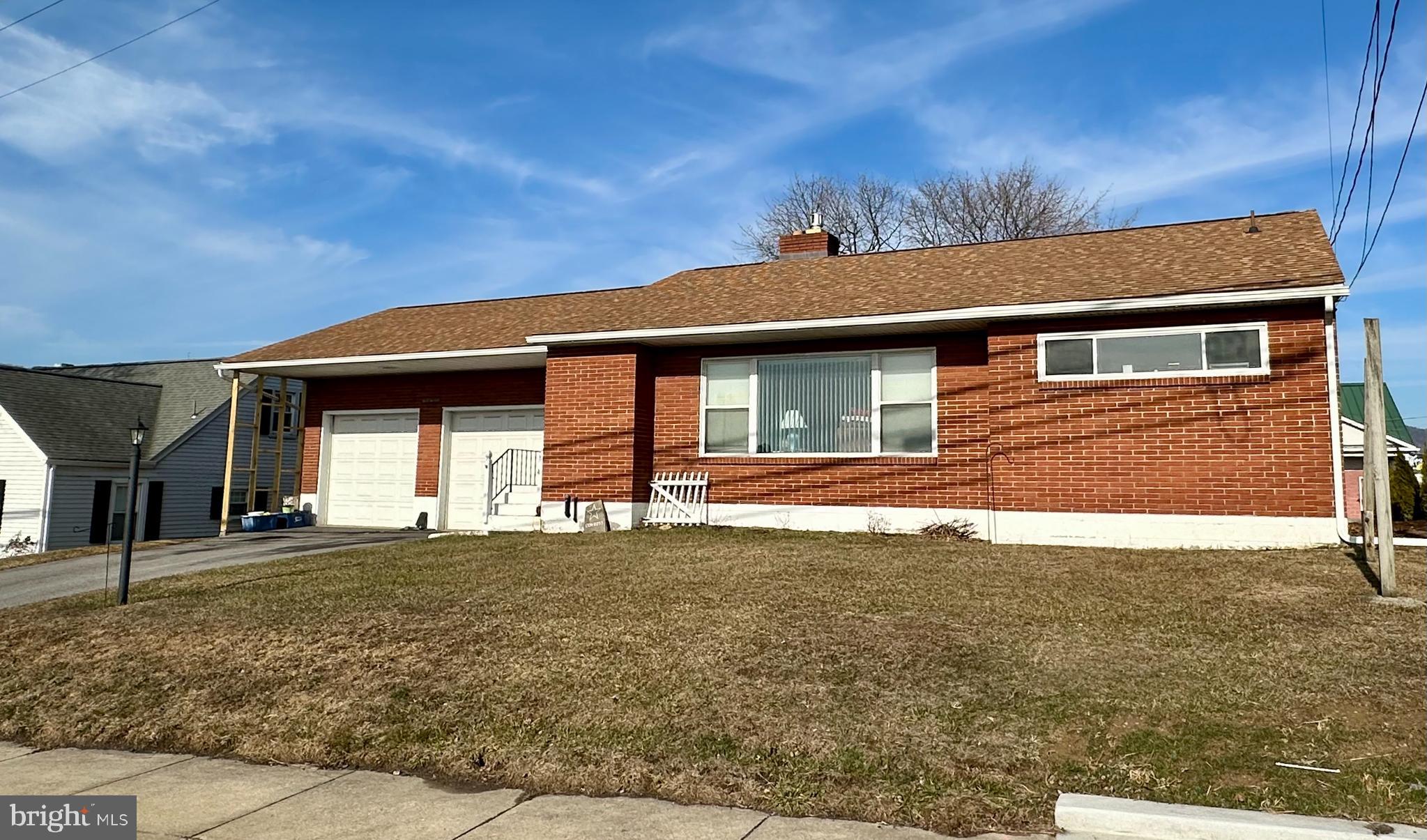 909 East Main Street Roaring Spring, PA 16673 - Photo 2 of 41 a front view of a house with a yard