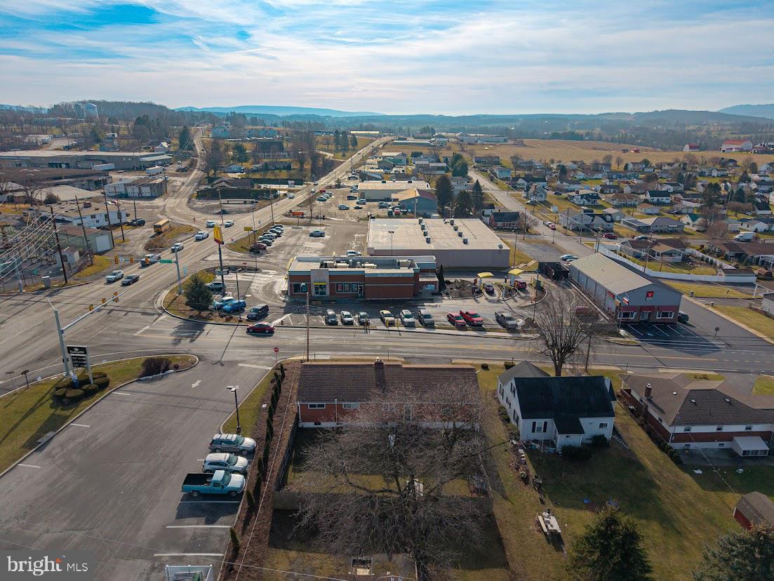 909 East Main Street Roaring Spring, PA 16673 - Photo 33 of 41 an aerial view of a residential building with parking