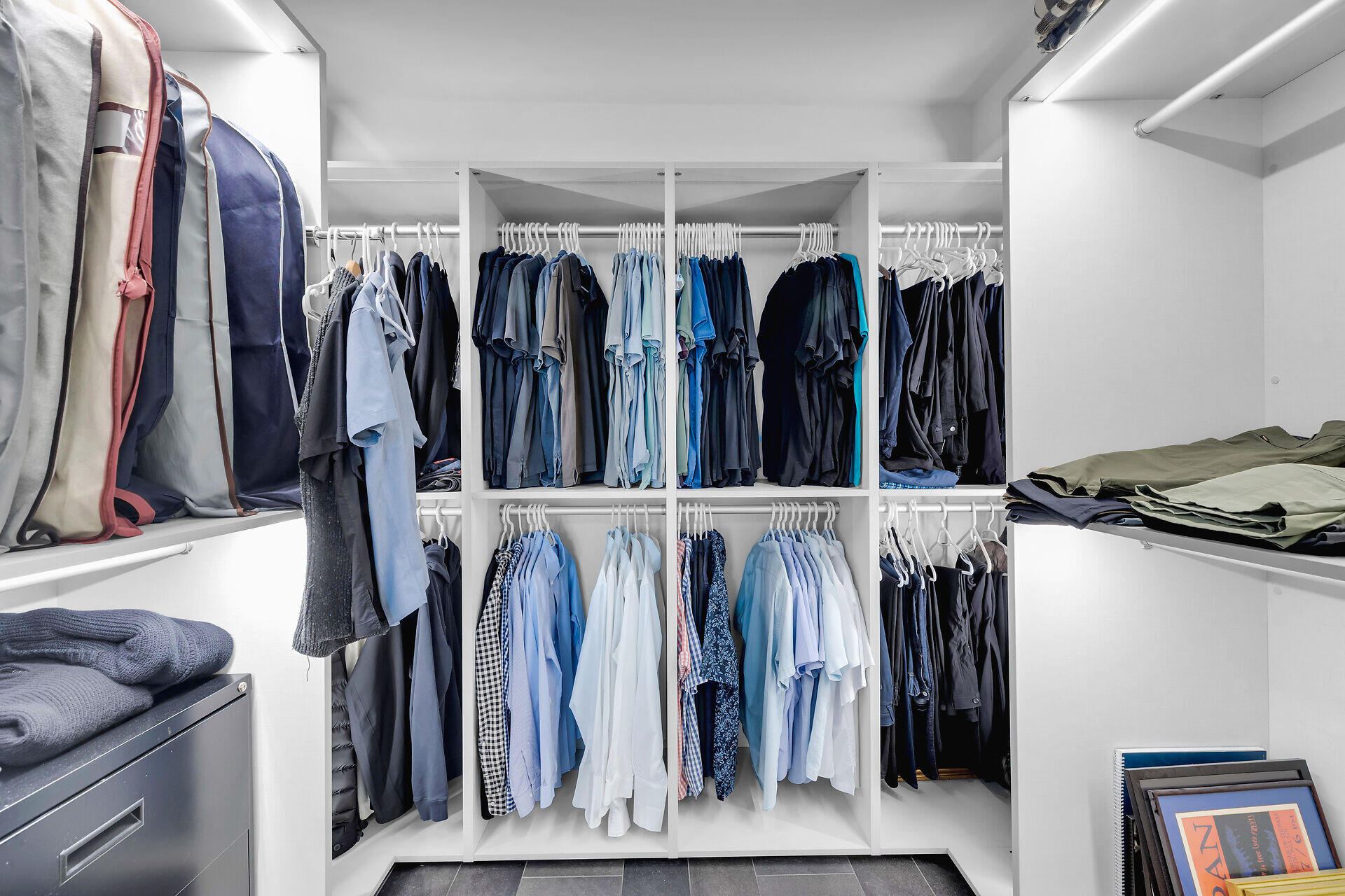 141 Simonton Street Key West, FL 33040 - Photo 27 of 49 a view of walk in closet with clothes and shoes