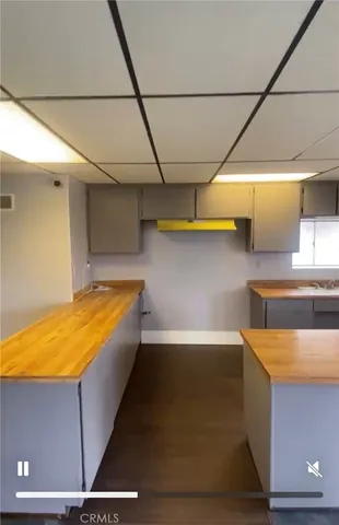 a lobby with furniture and a rug