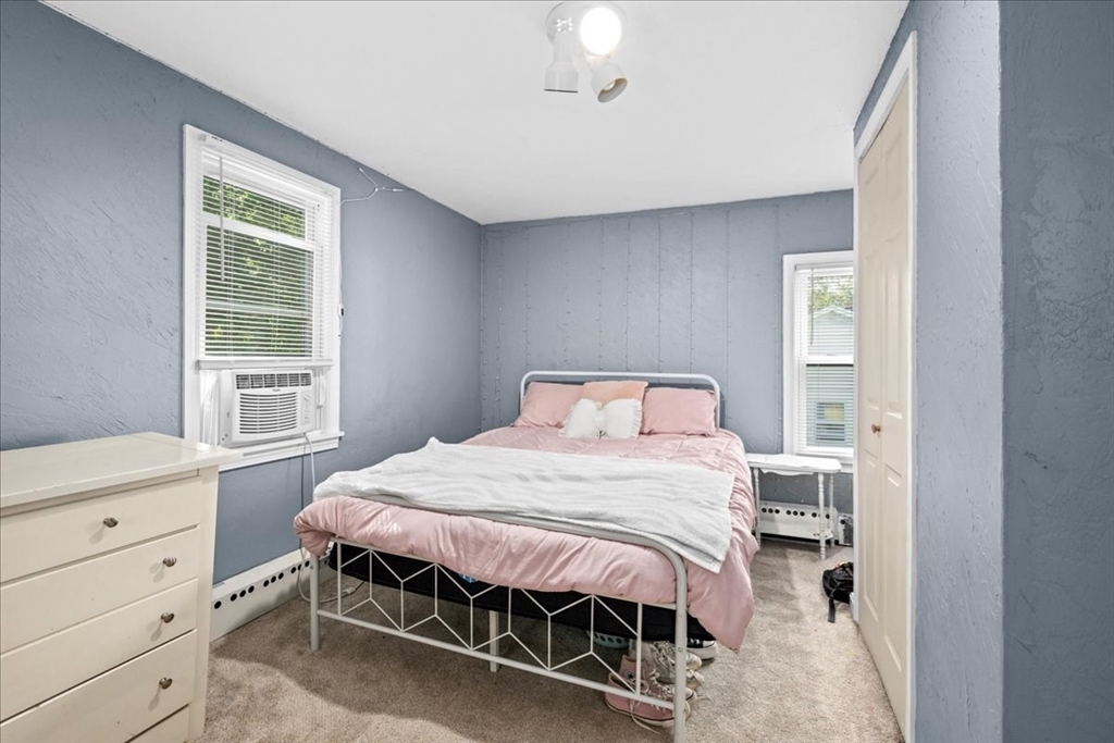 14 Elizabeth Street Dudley, MA 01571 - Photo 25 of 37 a bedroom with a bed and a window