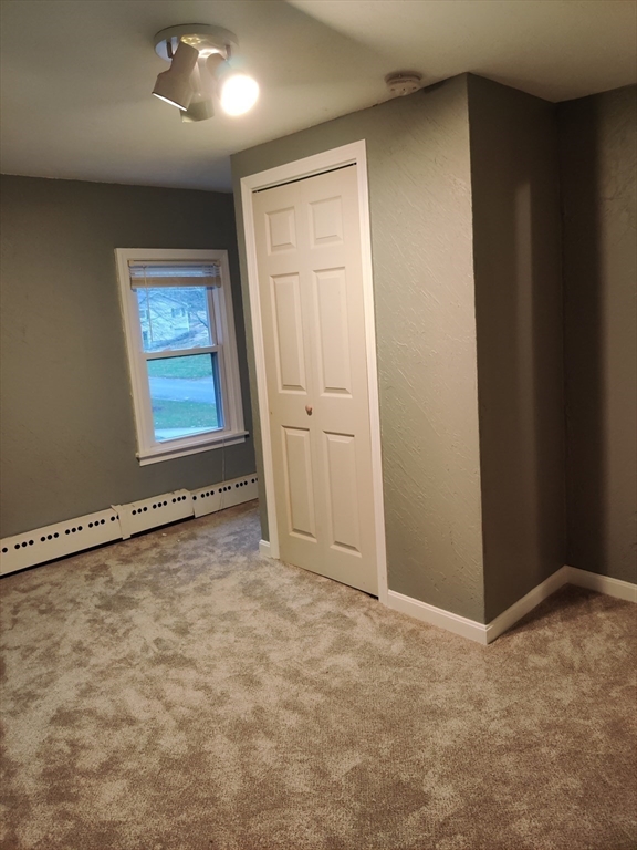 14 Elizabeth Street Dudley, MA 01571 - Photo 26 of 37 an empty room with windows