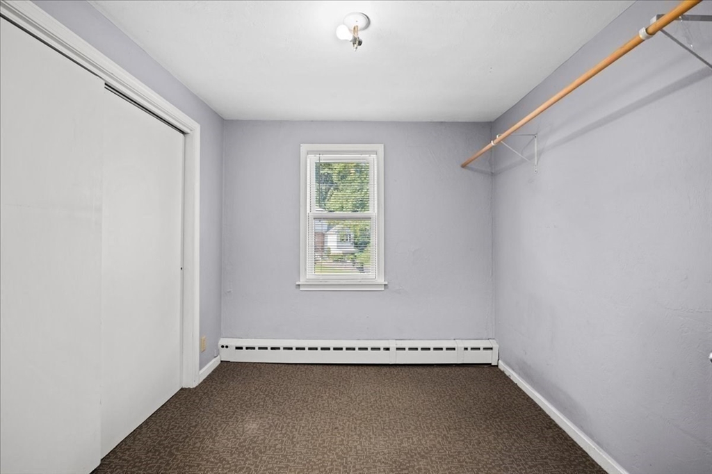 14 Elizabeth Street Dudley, MA 01571 - Photo 27 of 37 an empty room with a window