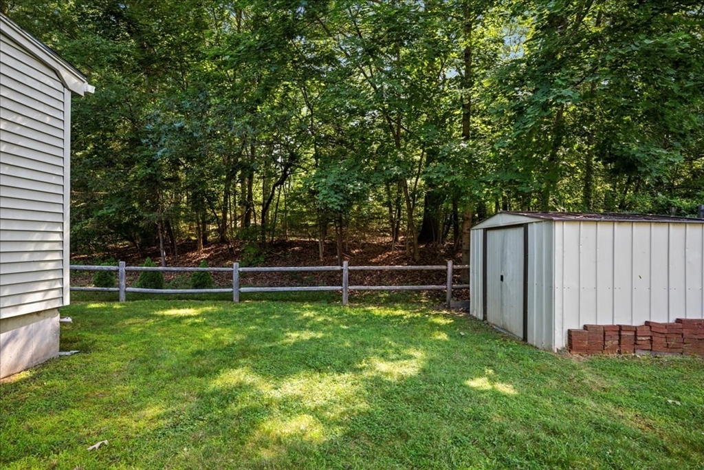 14 Elizabeth Street Dudley, MA 01571 - Photo 34 of 37 a view of a backyard with stairs