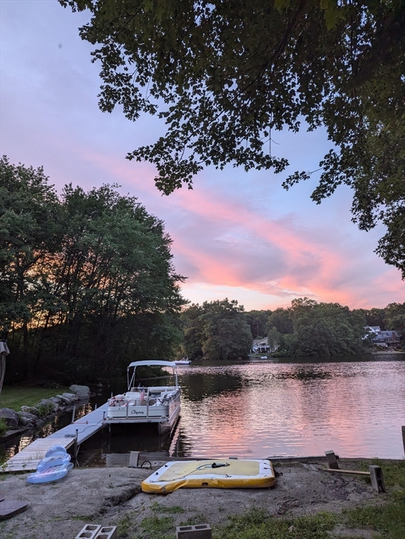 14 Elizabeth Street Dudley, MA 01571 - Photo 5 of 37 a view of a lake with a mountain