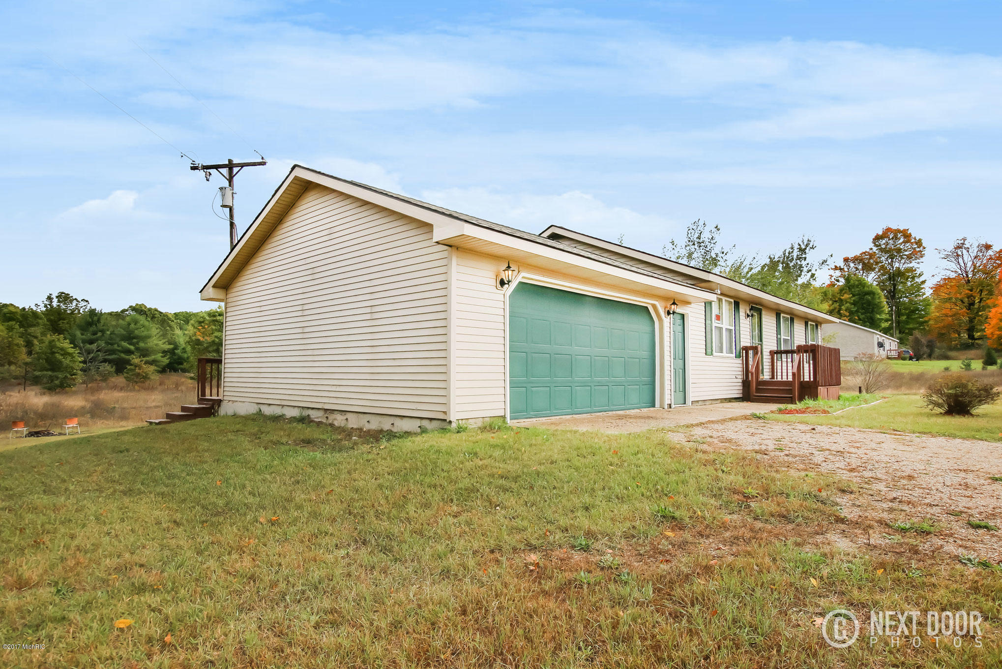 6732 West County Line Road Howard City, MI 49329 - Photo 2 of 35 6732 N West County Line Road