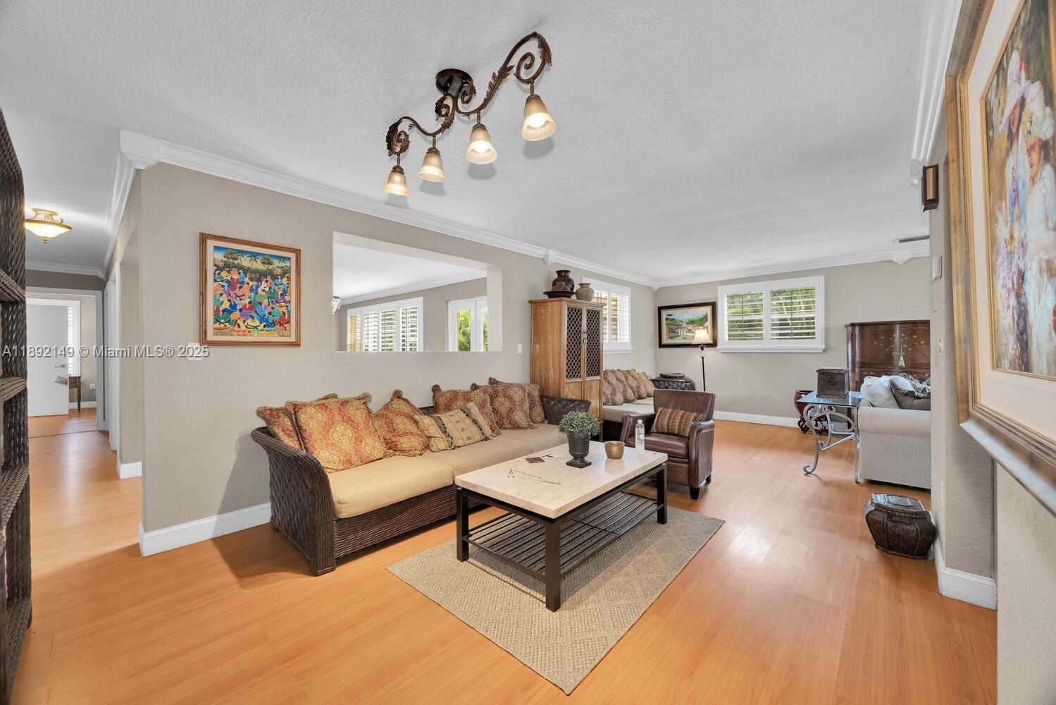 825 El Rado Street Coral Gables, FL 33134 - Photo 12 of 40 a living room with furniture