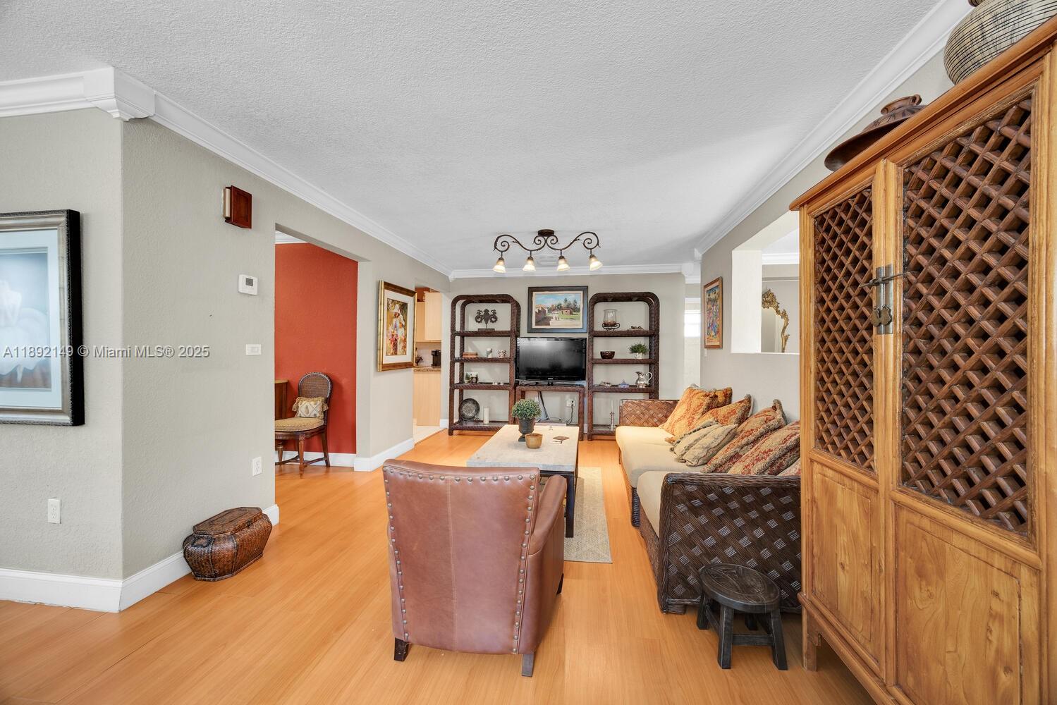 825 El Rado Street Coral Gables, FL 33134 - Photo 10 of 40 a room with furniture and gym equipment