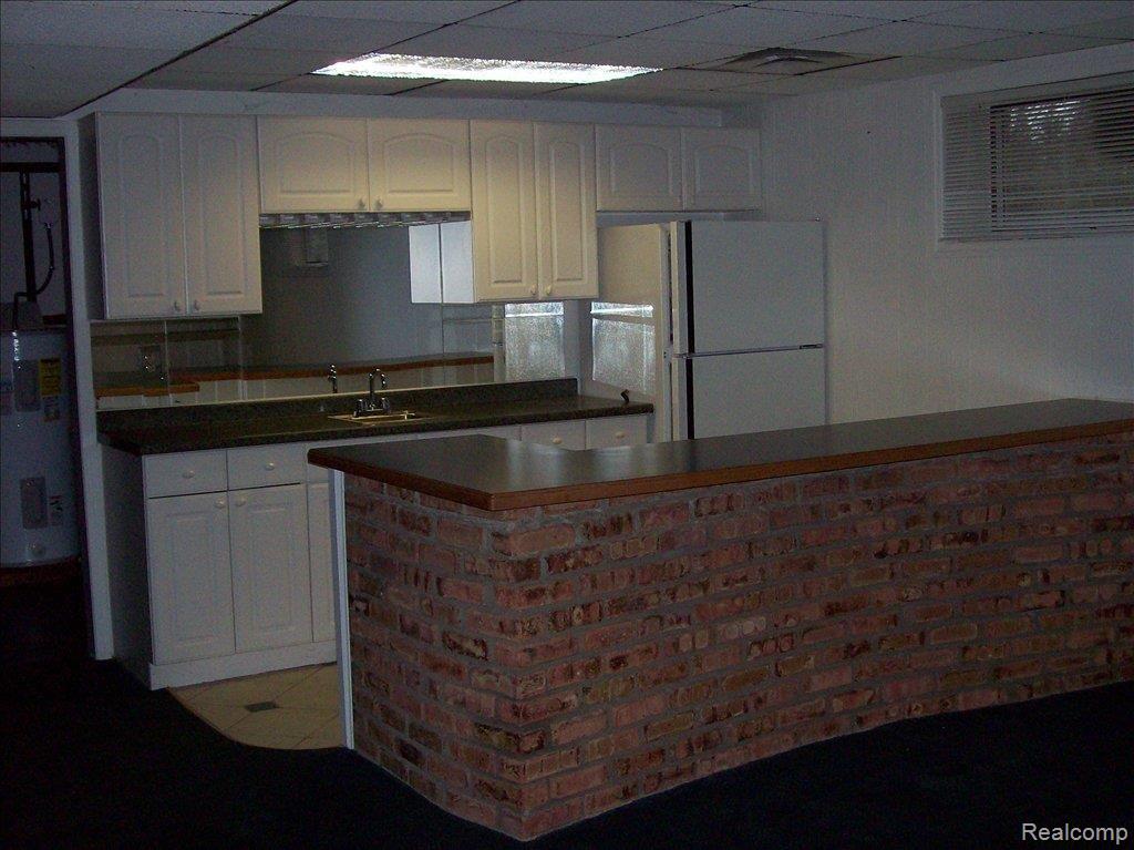 5214 General Squier Road Dryden, MI 48428 - Photo 7 of 12 Basement Kitchenette