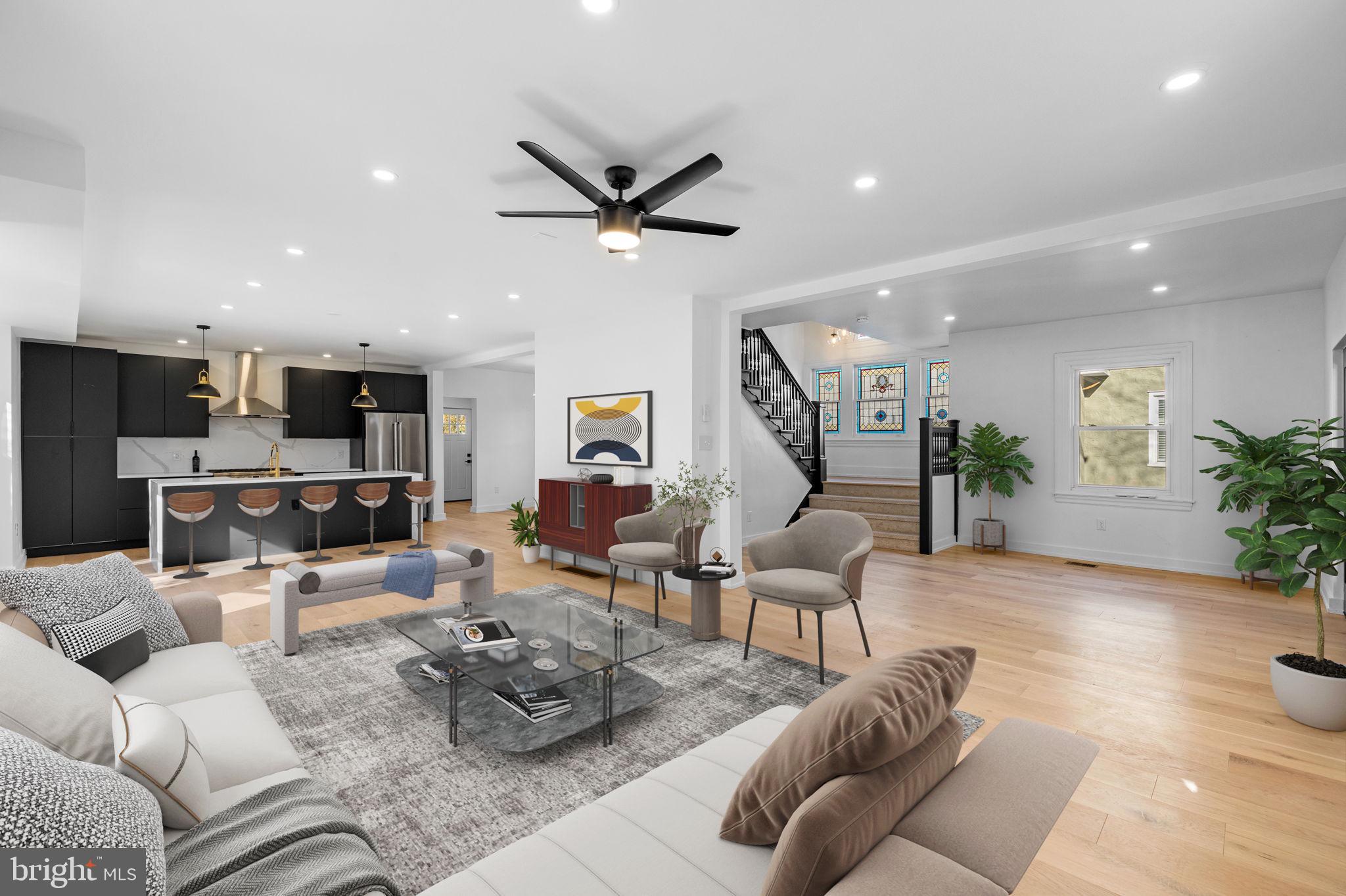 222 Church Road Ardmore, PA 19003 - Photo 11 of 69 a living room with furniture and a view of kitchen