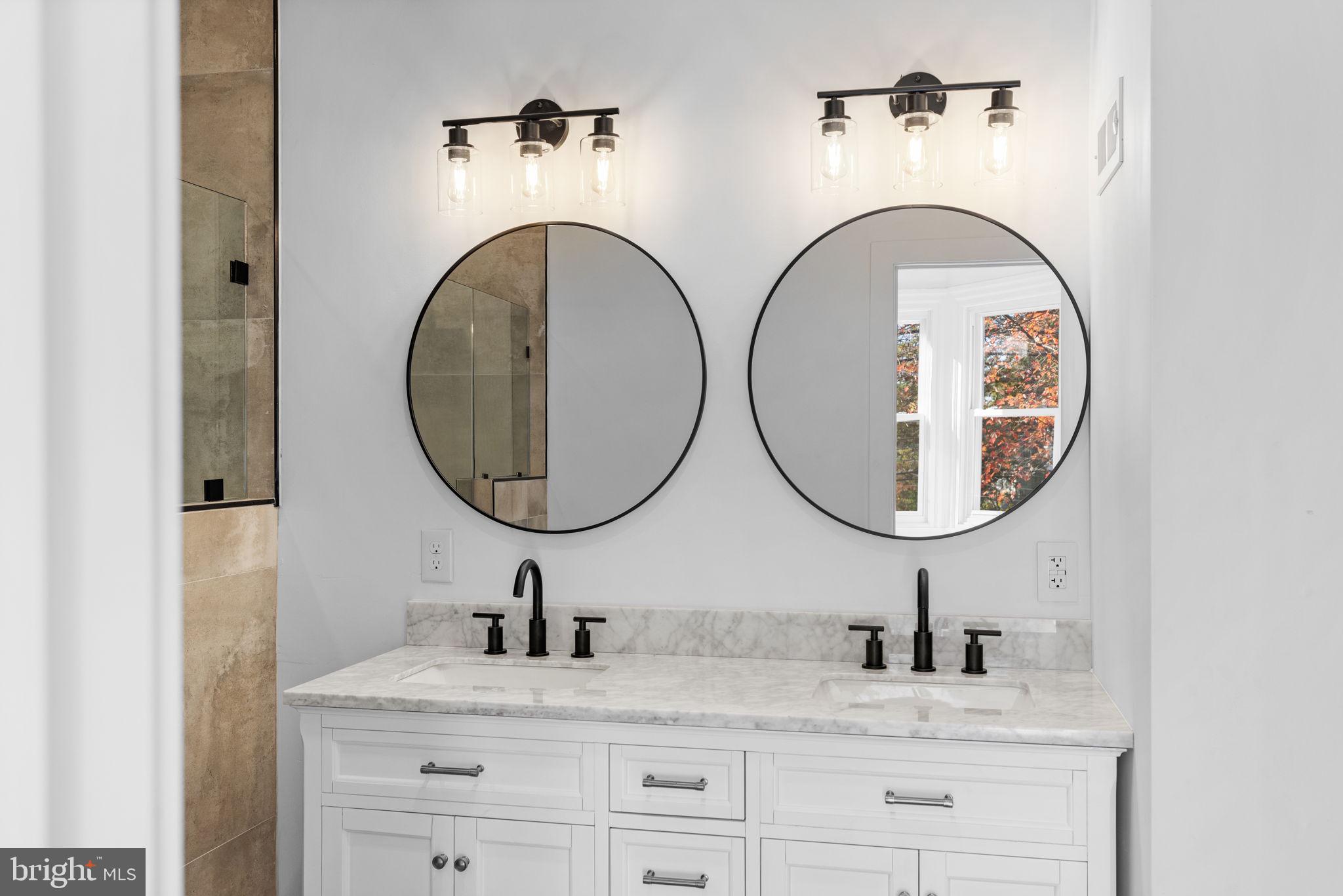 222 Church Road Ardmore, PA 19003 - Photo 44 of 69 a bathroom with a sink and a mirror