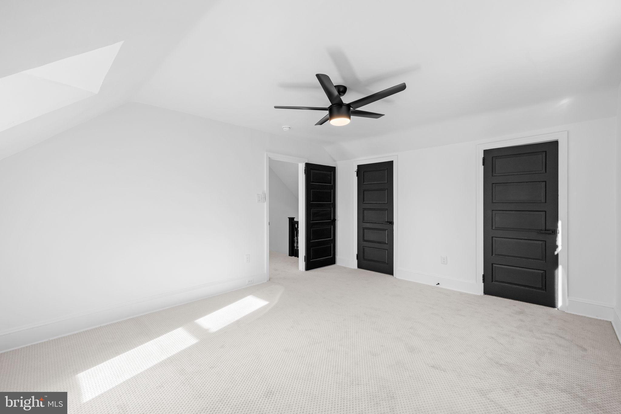 222 Church Road Ardmore, PA 19003 - Photo 59 of 69 a view of a big room with closet and a ceiling fan
