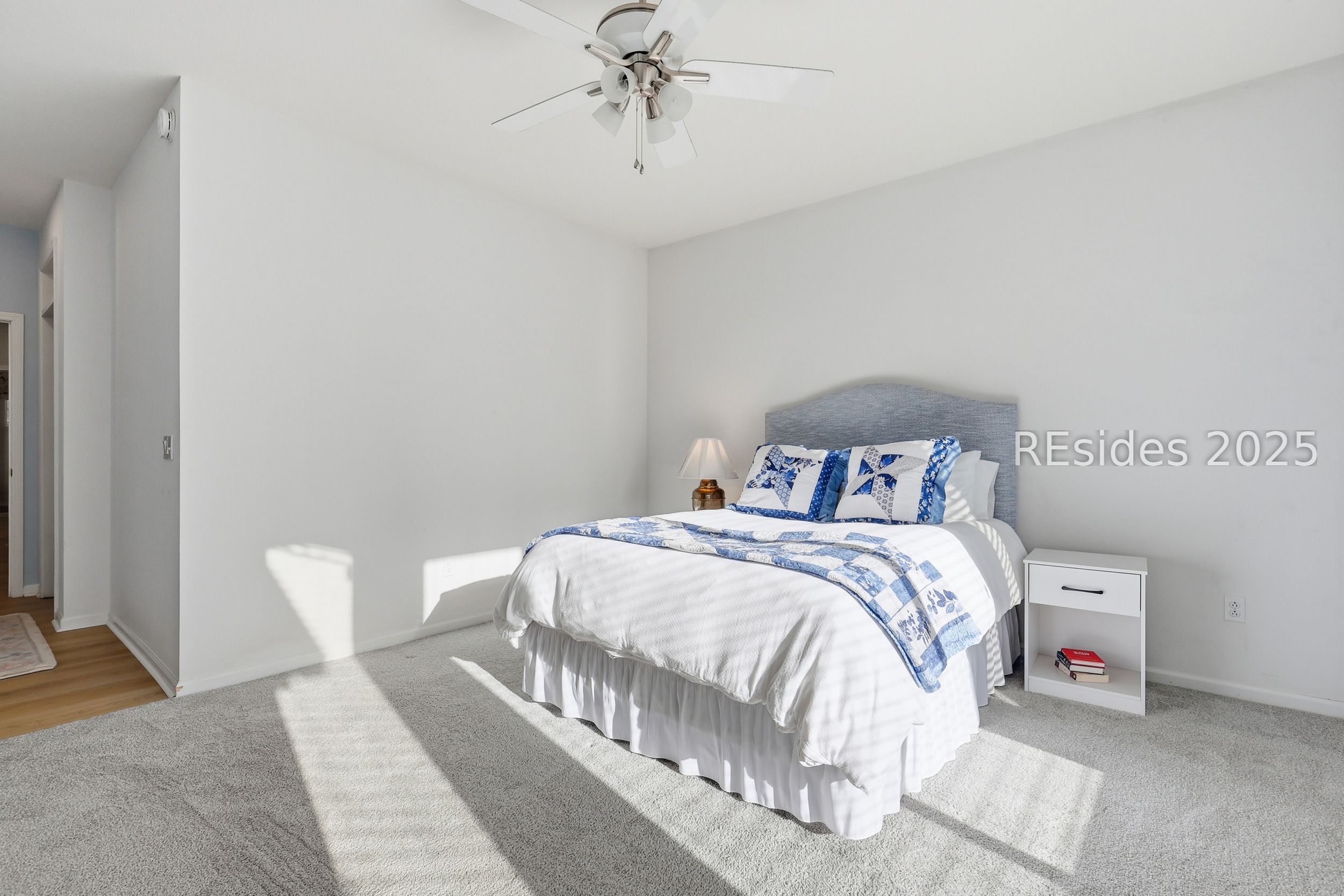 19 Hampton Circle Bluffton, SC 29909 - Photo 25 of 48 Light and bright primary bedroom