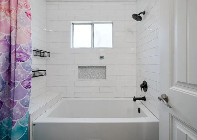 a bathroom with a bathtub