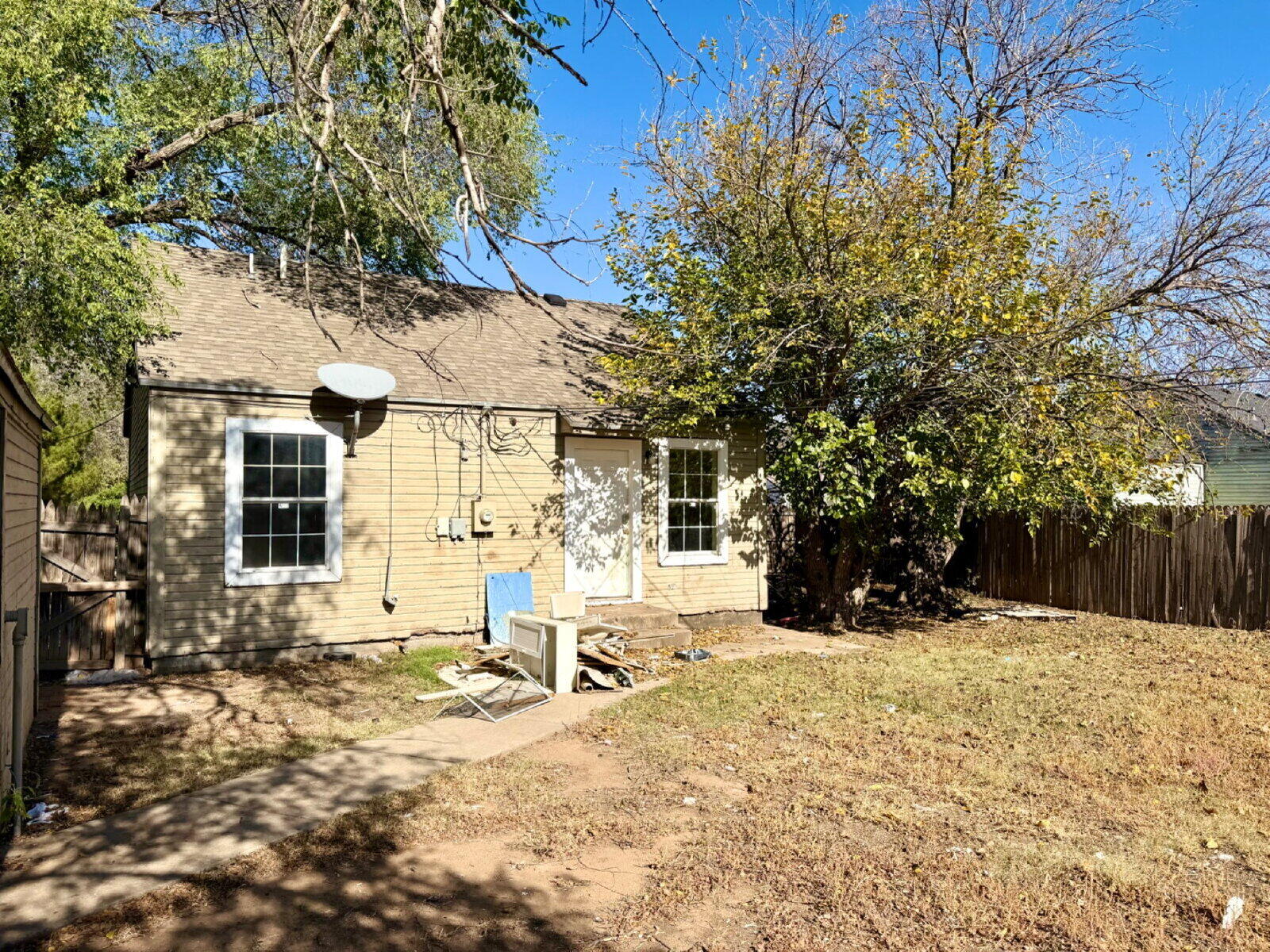 2423 25th Street Lubbock, TX 79411 - Photo 13 of 14 a view of a house with snow in the yard