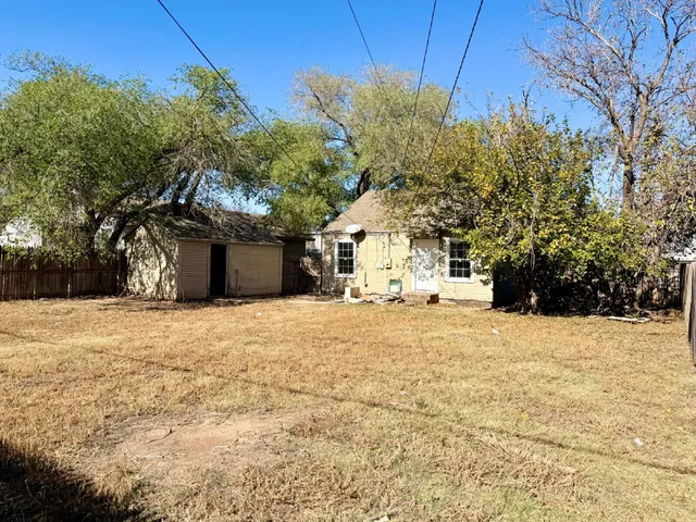 a house with trees in front of it