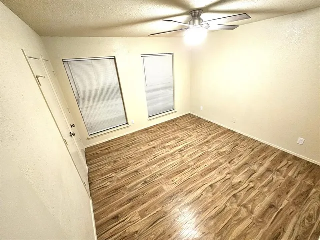 a kitchen with a stove a refrigerator and a sink