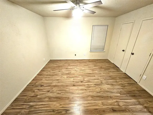a bathroom with a sink mirror toilet and shower
