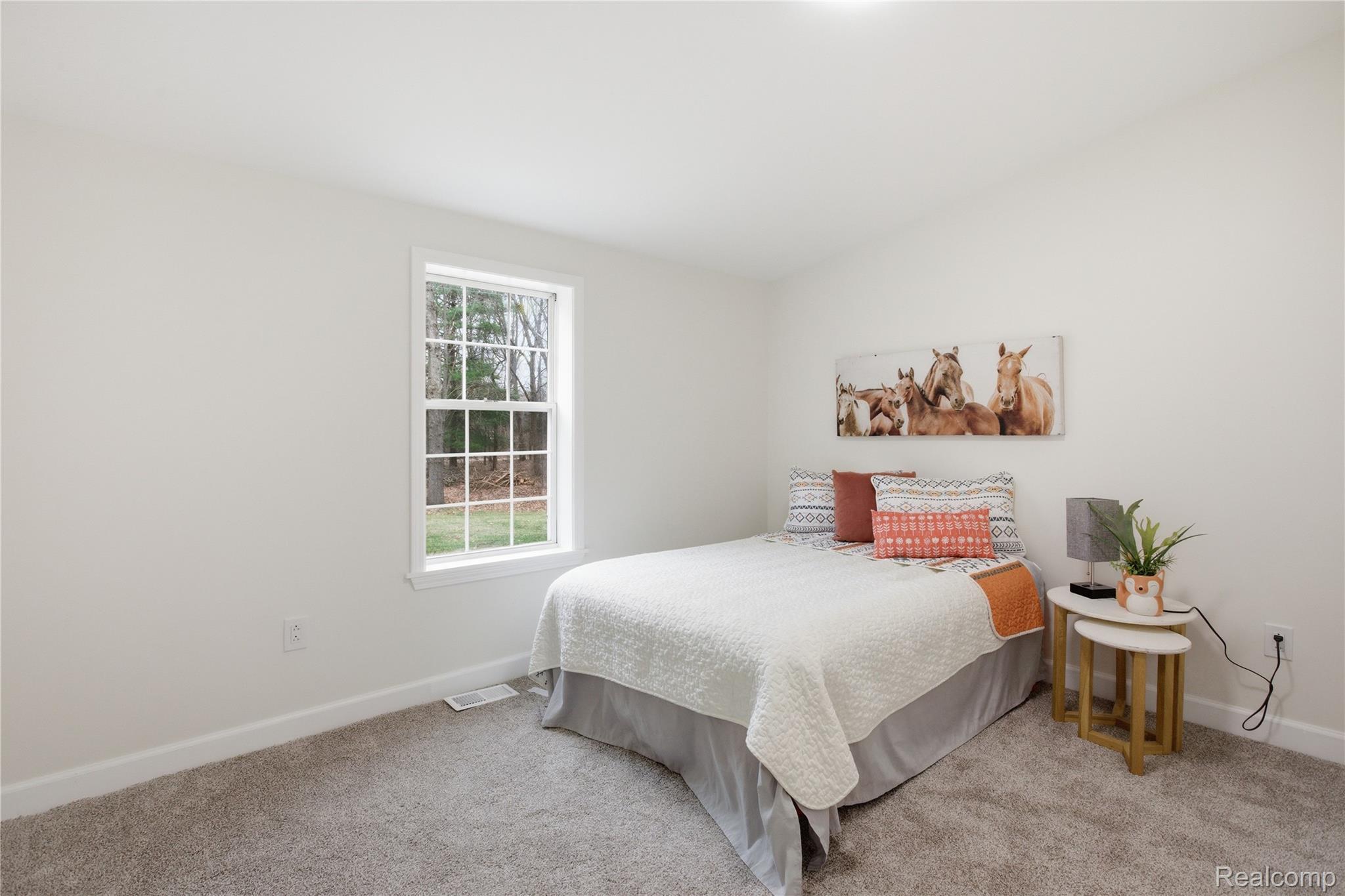 5350 List Road Grass Lake, MI 49240 - Photo 32 of 71 Bedroom featuring light colored carpet and baseboards