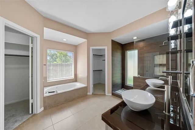 a bathroom with a toilet sink and shower