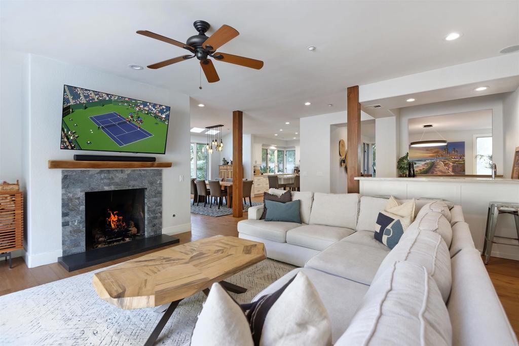 1739 Sienna Canyon Drive Encinitas, CA 92024 - Photo 13 of 29 a living room with furniture fireplace and window
