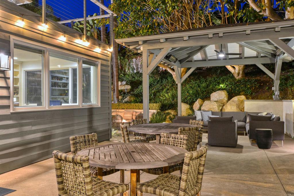 1739 Sienna Canyon Drive Encinitas, CA 92024 - Photo 25 of 29 a view of patio with table and chairs potted plants