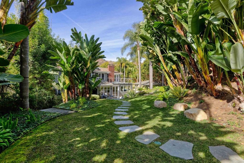 1739 Sienna Canyon Drive Encinitas, CA 92024 - Photo 26 of 29 a view of a house with a yard