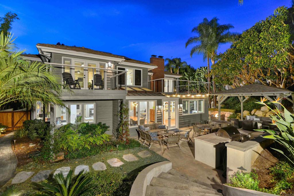 1739 Sienna Canyon Drive Encinitas, CA 92024 - Photo 28 of 29 a front view of a house with a yard