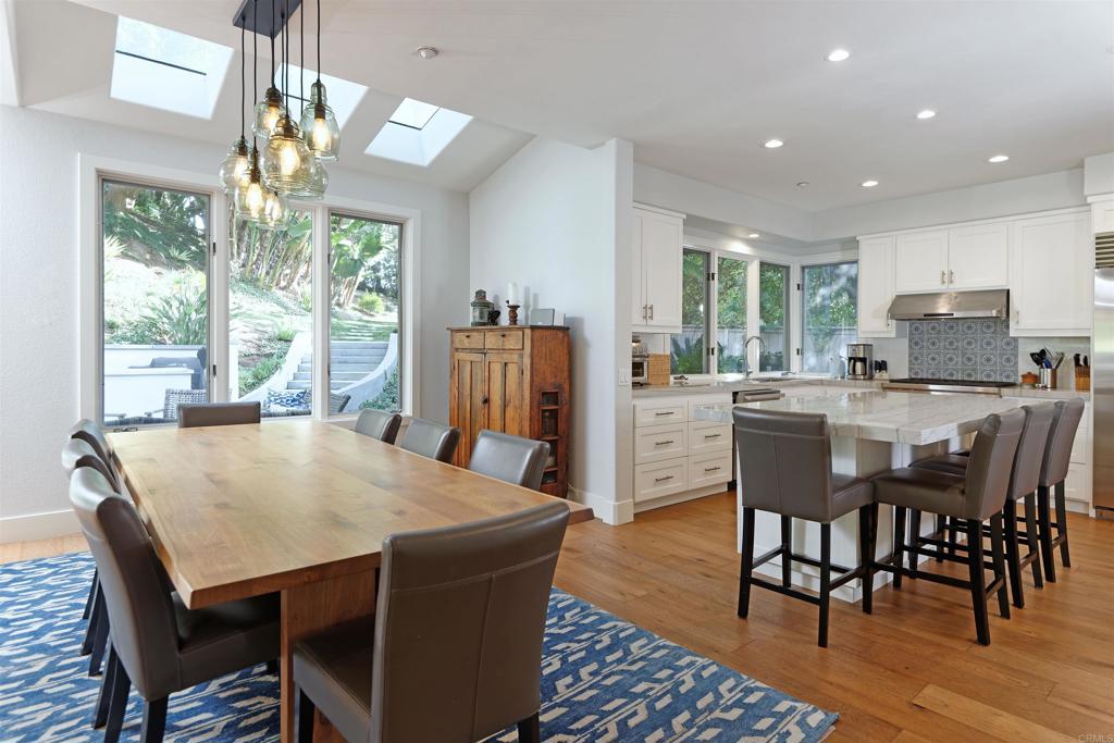 1739 Sienna Canyon Drive Encinitas, CA 92024 - Photo 4 of 29 a view of a dining room with furniture window and outside view