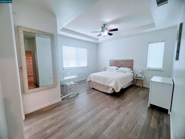 a room with a bed and a chair