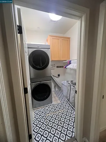 a bedroom with a bed and cabinets