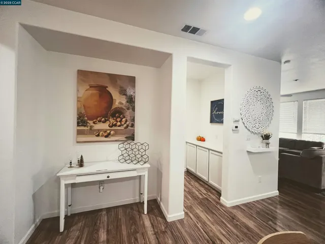 a view of a bathroom with sink dryer and washer