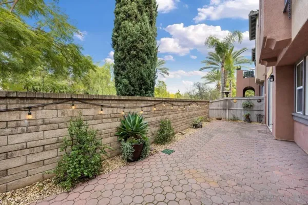 a backyard of a house with lots of green space