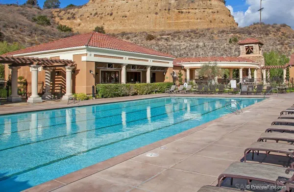 front view of a building with a garden