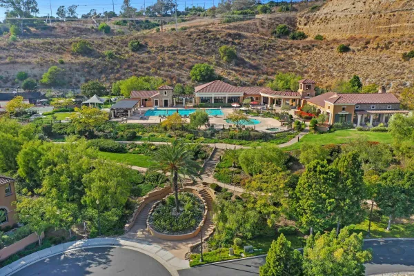 an aerial view of multiple house with outdoor space