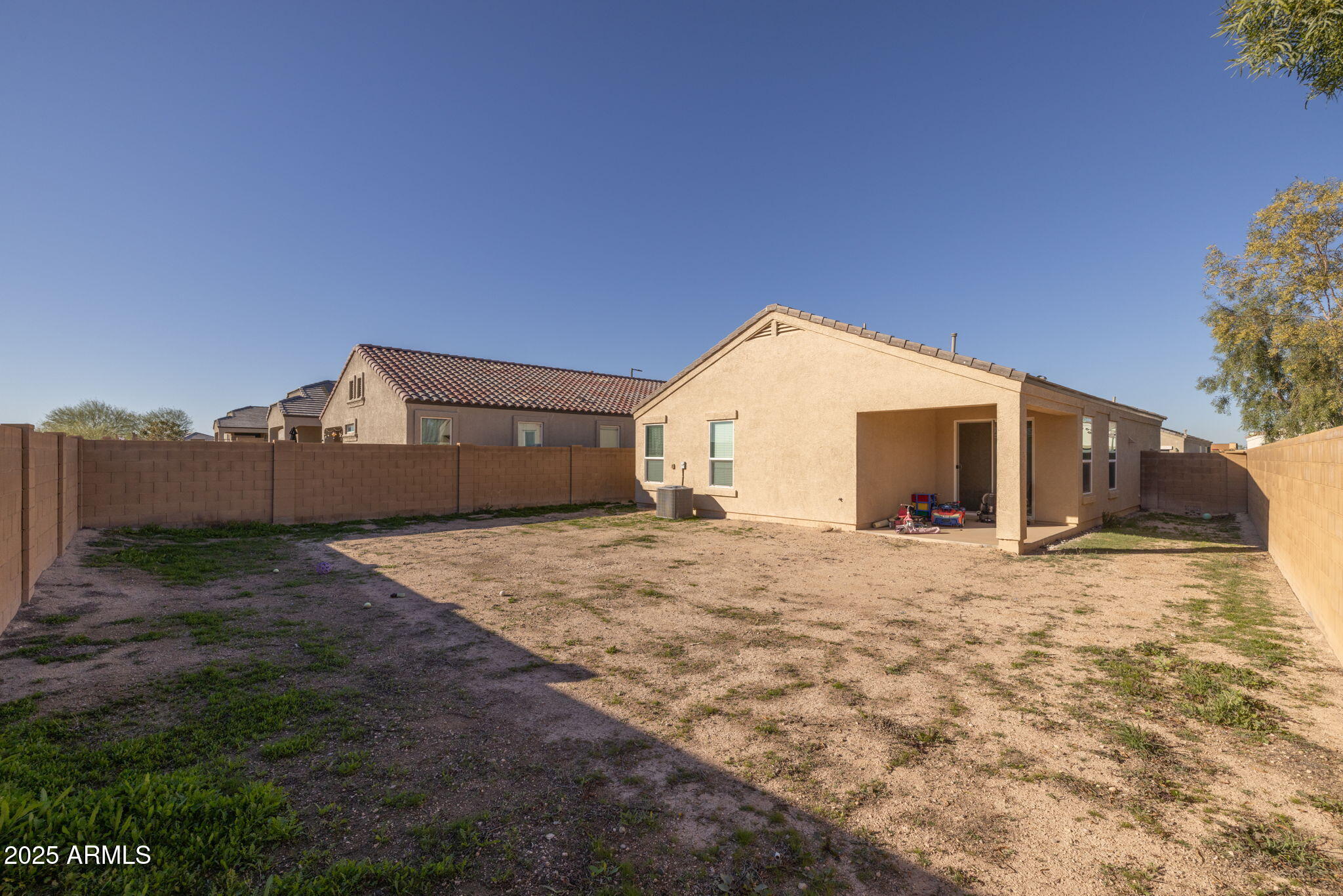 8269 West Rushmore Way Florence, AZ 85132 - Photo 24 of 27 a view of a house with a yard