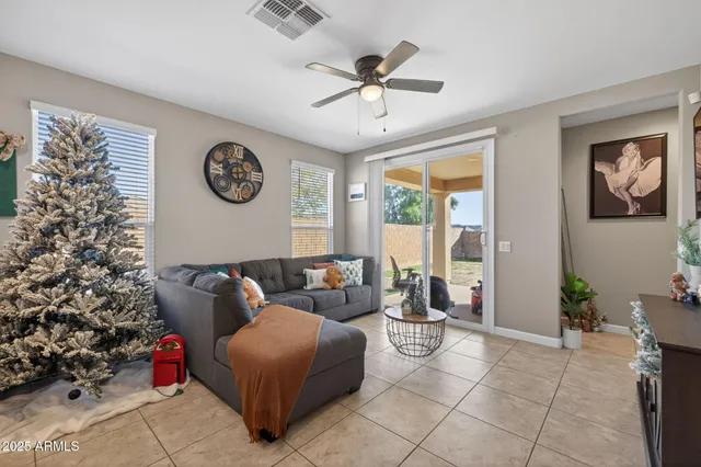 a living room with furniture and a window