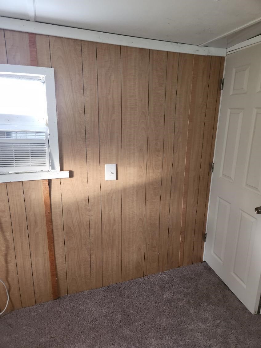 412 Cottonwood Church Road, Unit 7 Rosenberg, TX 77471 - Photo 3 of 10 a view of an entryway with wooden floor