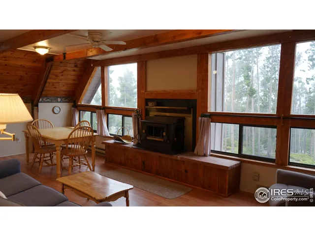 a black and white photo of a living room