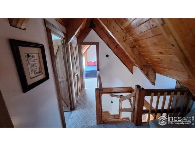 a upper view of living room with furniture and floor to ceiling window