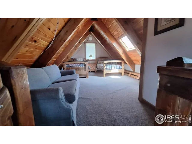 a black and white photo of a living room