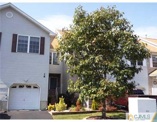 18 Lakeview Drive Helmetta, NJ 08828 - Photo 2 of 11 a front view of a house with garden