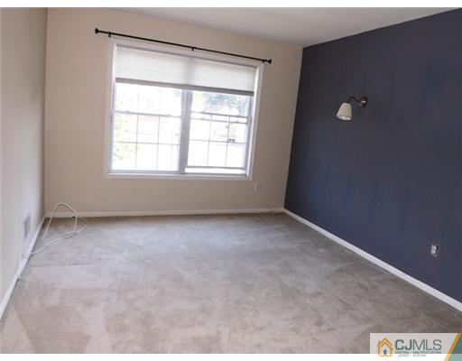 18 Lakeview Drive Helmetta, NJ 08828 - Photo 9 of 11 an empty room with a window