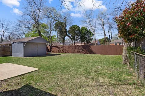a view of a backyard with a garden