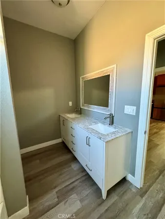 a view of workspace with wooden floor