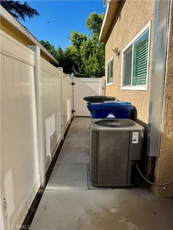a view of balcony with wooden wall and shower