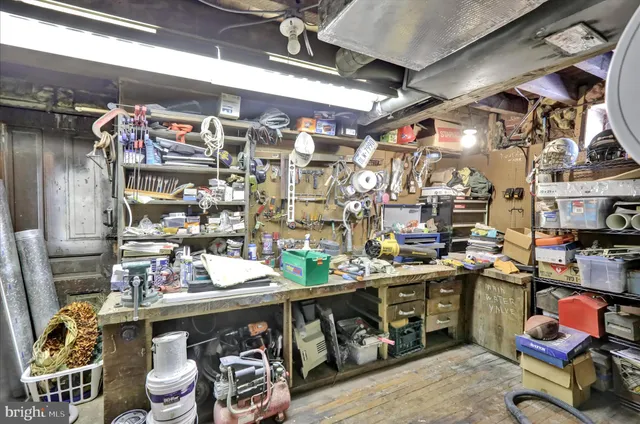 a view of swimming pool with an outdoor seating