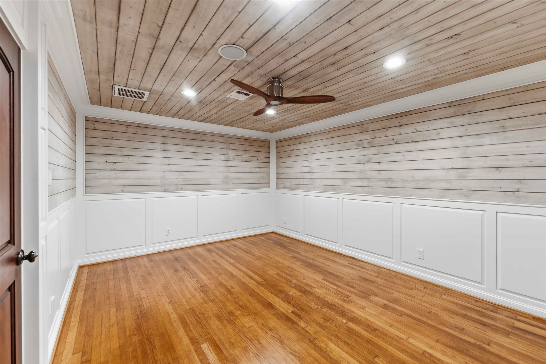 4031 Fernwood Drive Houston, TX 77021 - Photo 22 of 34 a view of empty room with wooden floor