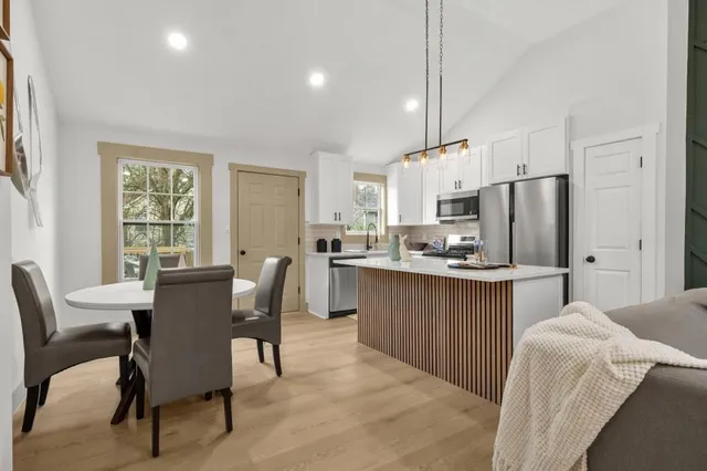 a view of a balcony with chairs