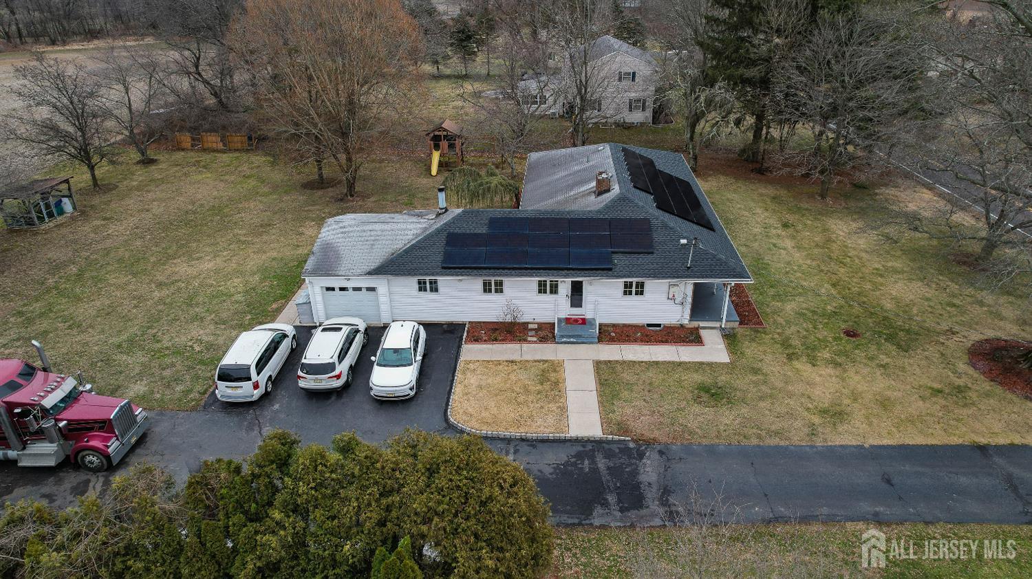 168 Line Road West Windsor, NJ 08550 - Photo 10 of 12 a view of a house with a yard